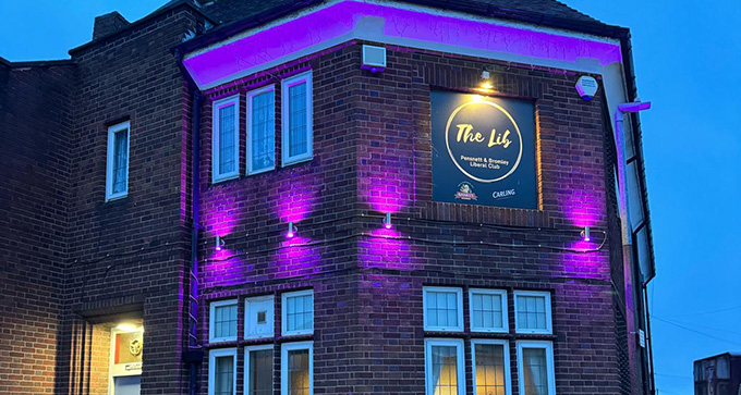 a pub with pink lights installed to highlight the building by Viper Technical